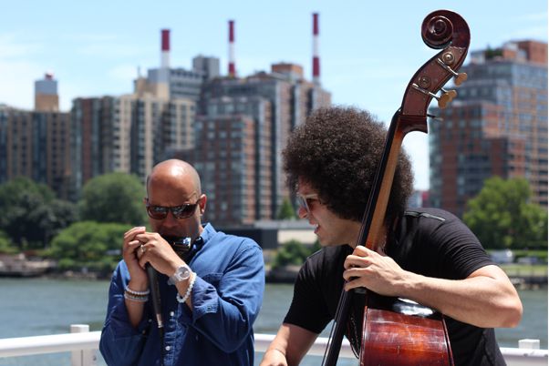 Two musicians performing outdoors in Central Park, NY