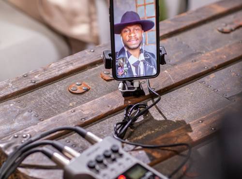 P4 with call-in guest on a mobile phone