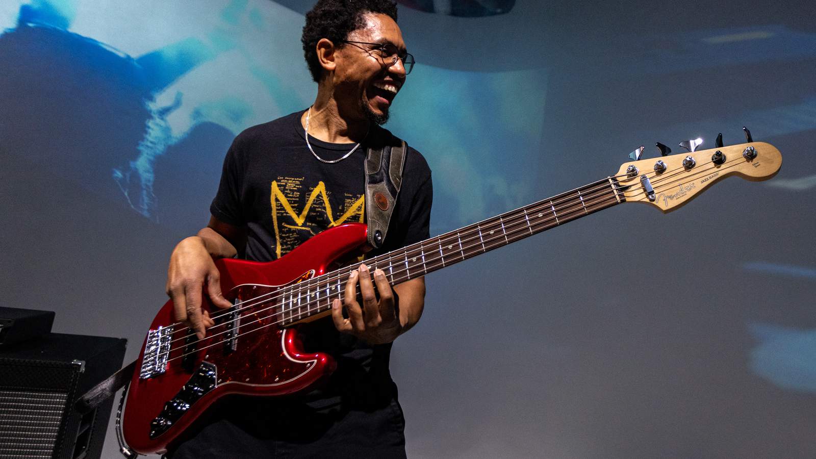Bassist Alex "Busby" Smith performing with his bass