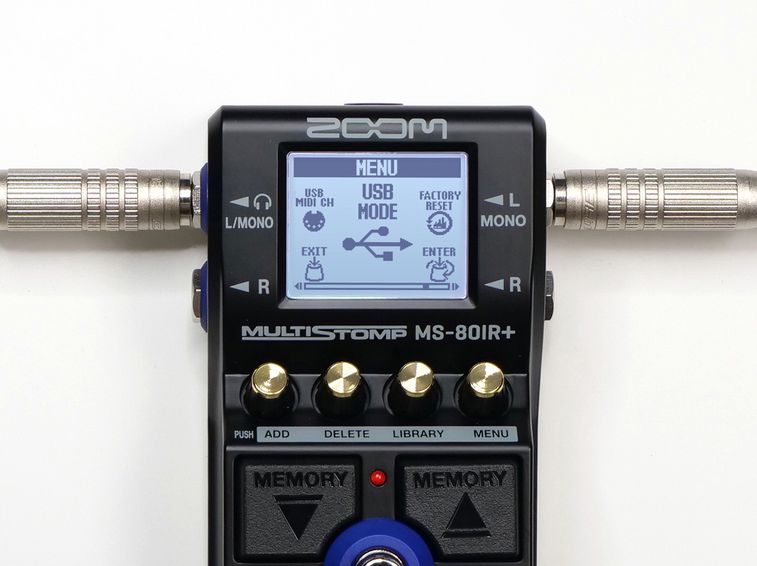 MS-80IR+ at the feet of a guitarist wearing sneakers.