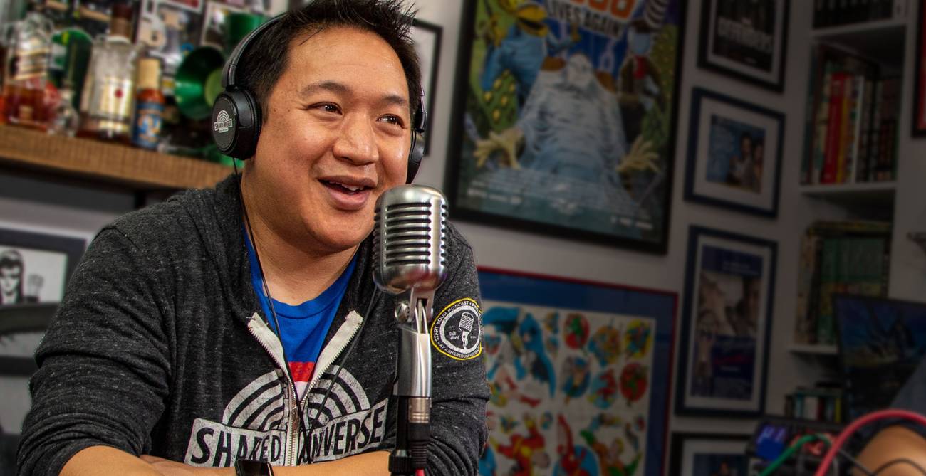 Ming Chen speaking into a microphone