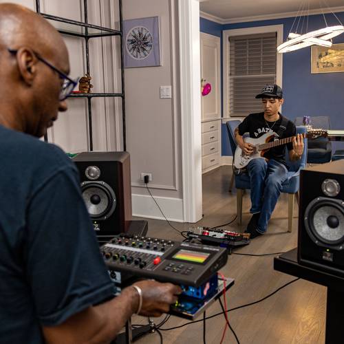 Omar Hakim mixing live sound through the R20 with studio monitors