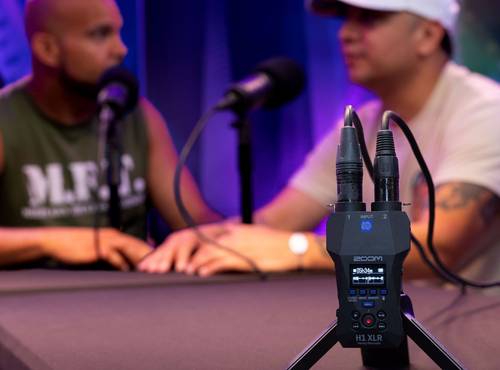 H1 XLR being used by two podcast hosts with two microphone inputs