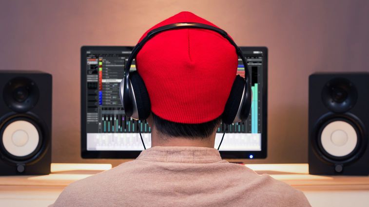 podcaster at computer
