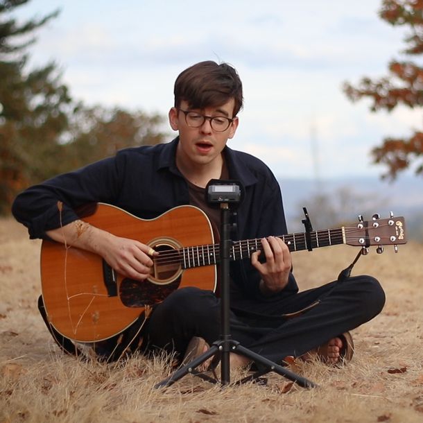 Josh recording in a meadow in Oregon.