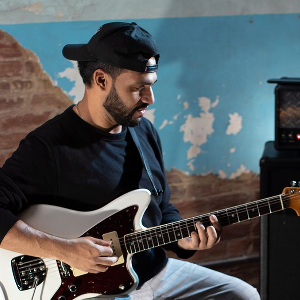 Ricardo Ramos playing guitar