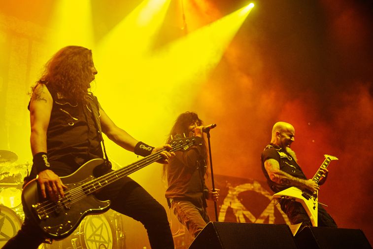 Frank Bello on stage with Anthrax