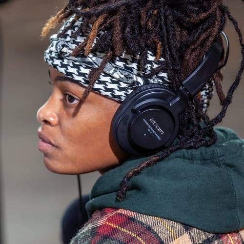 Podcaster wearing headphones