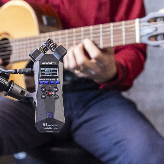 Guitar player using the H1e overdub feature to record multiple layers