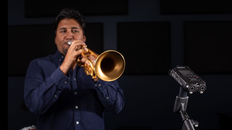 Trumpeter, Mike Rodriguez, playing into a H4n Pro in the studio.