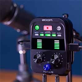 Zoom device in front of a microphone